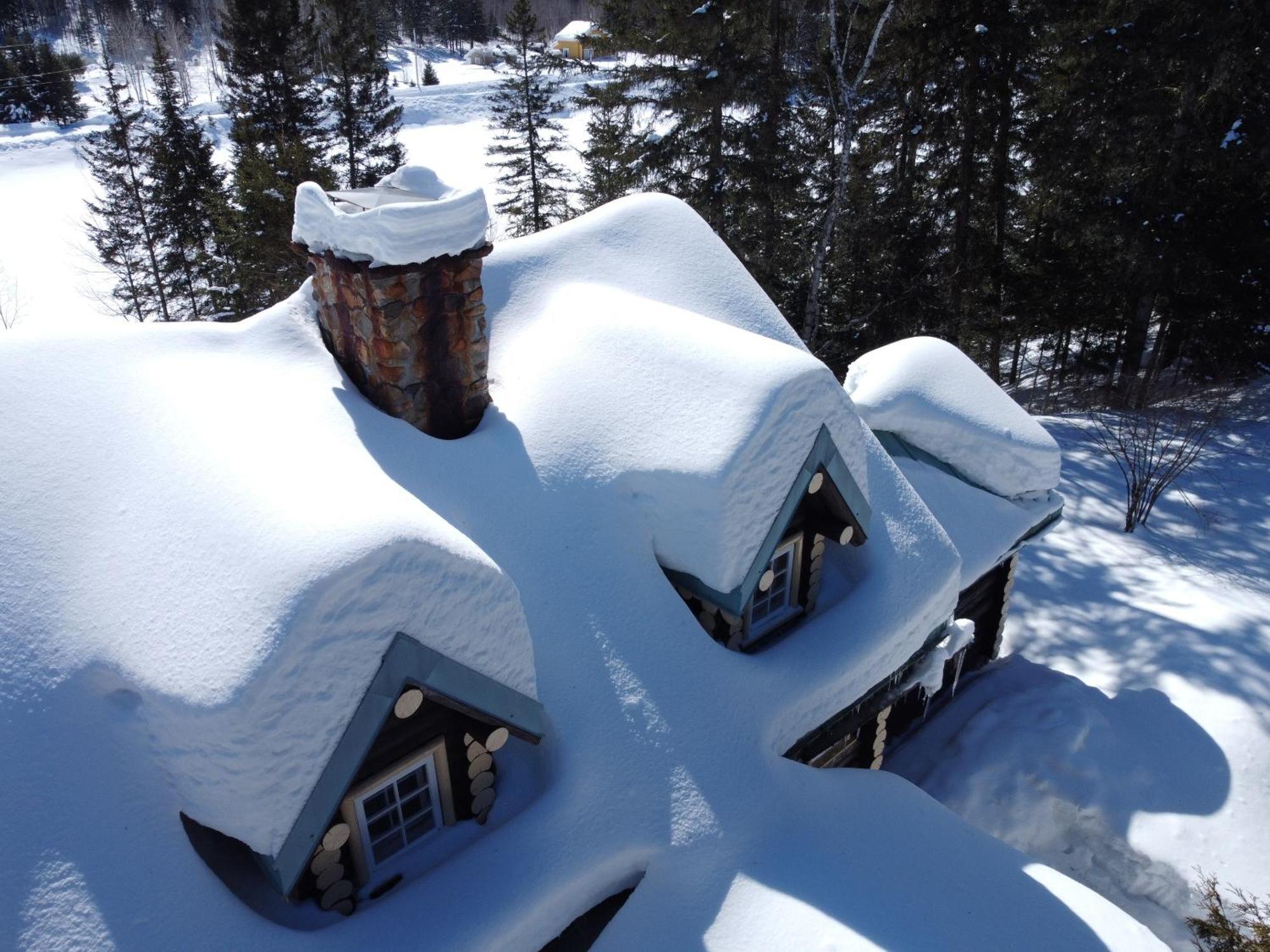 Domaine Le Bostonnais - Le Village En Bois Rond La Tuque Bagian luar foto